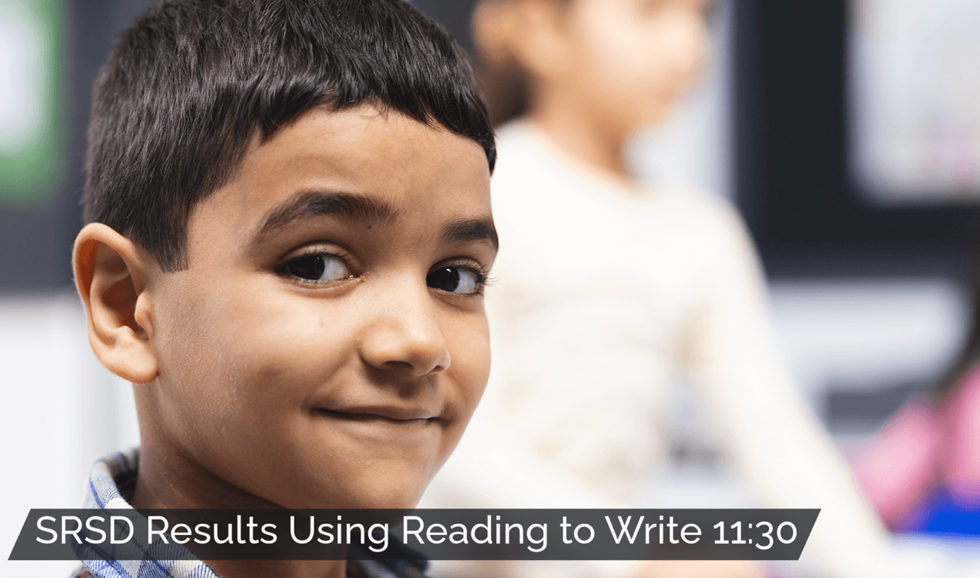 Smiling boy in a classroom with the title 'SRSD Results Using Reading to Write' and video length indicator, 11:30, shown on the image.